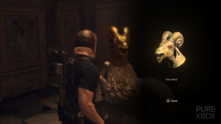 Resident Evil 4 Remake headless statue