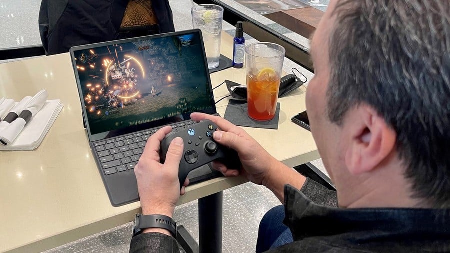 Phil Spencer Playing Games While Working During Meetings
